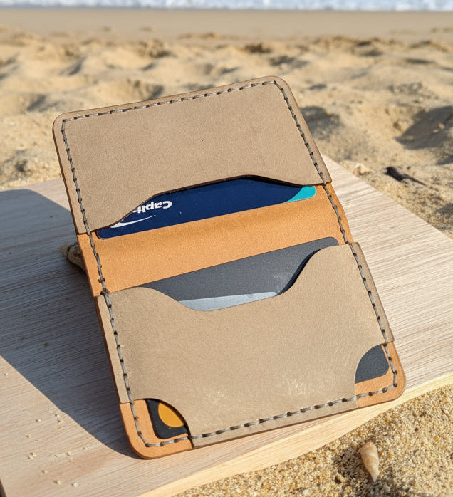 Handmade four pocket Italian leather folding wallet. Cognac and Stone