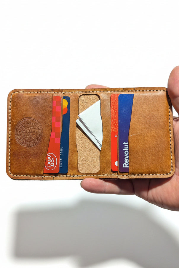 The Carlyon slim full-grain veg tan leather wallet with six pockets for cards and cash organization