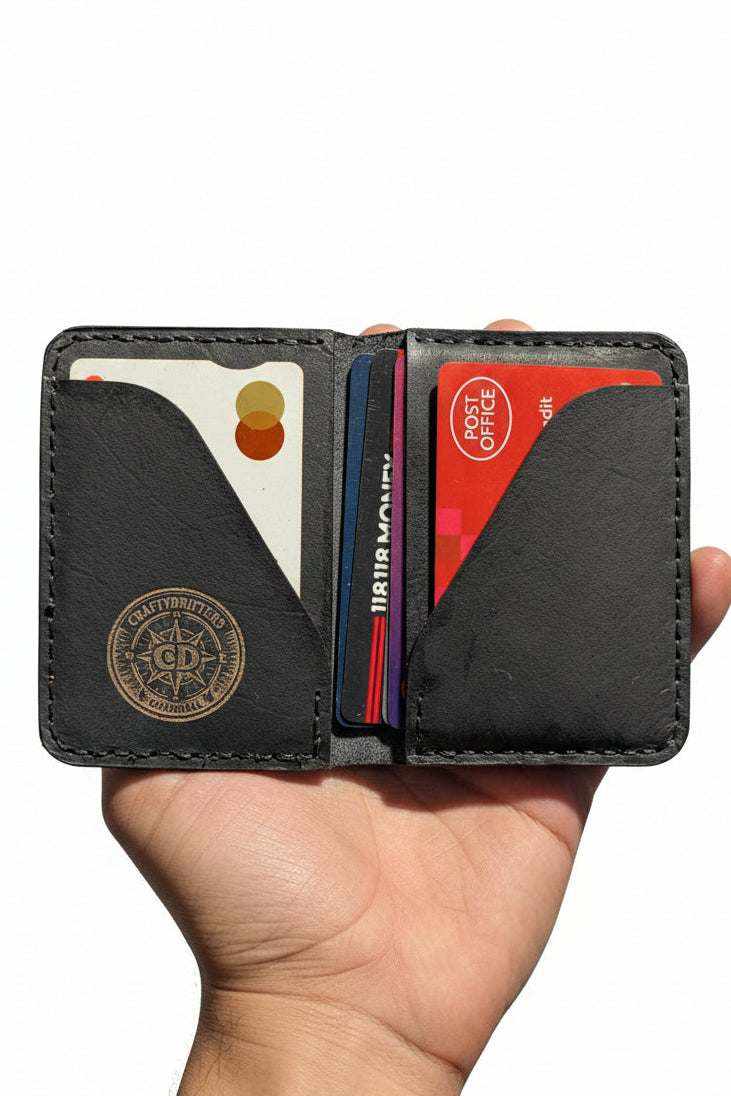 Devonport black full-grain leather bi-fold wallet with four card pockets