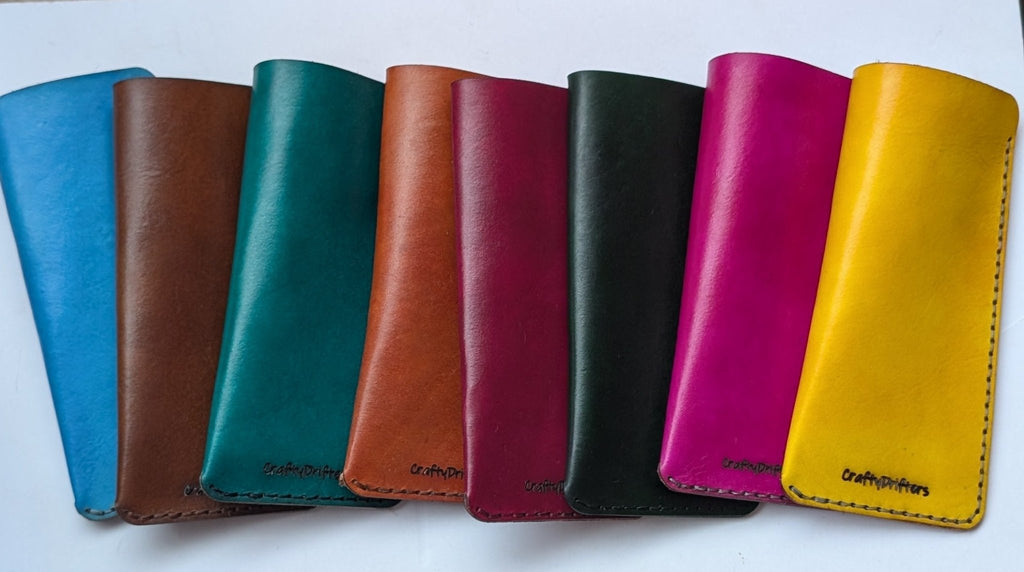 Alt Tag: Handmade leather glasses case in vibrant colors, full-grain vegetable-tanned leather, hand-dyed double-stitched