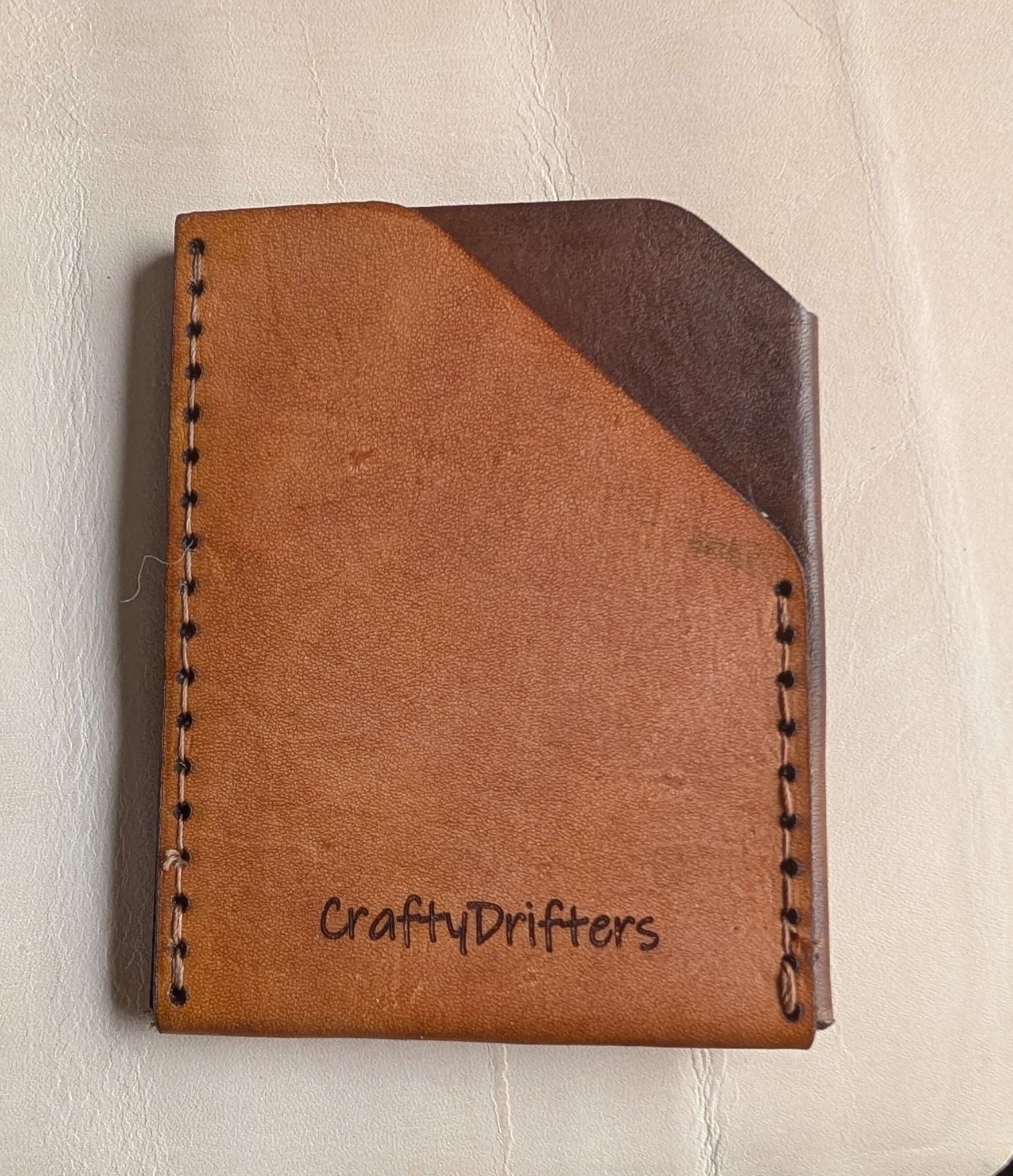 Minimalist hand made leather card sleeve