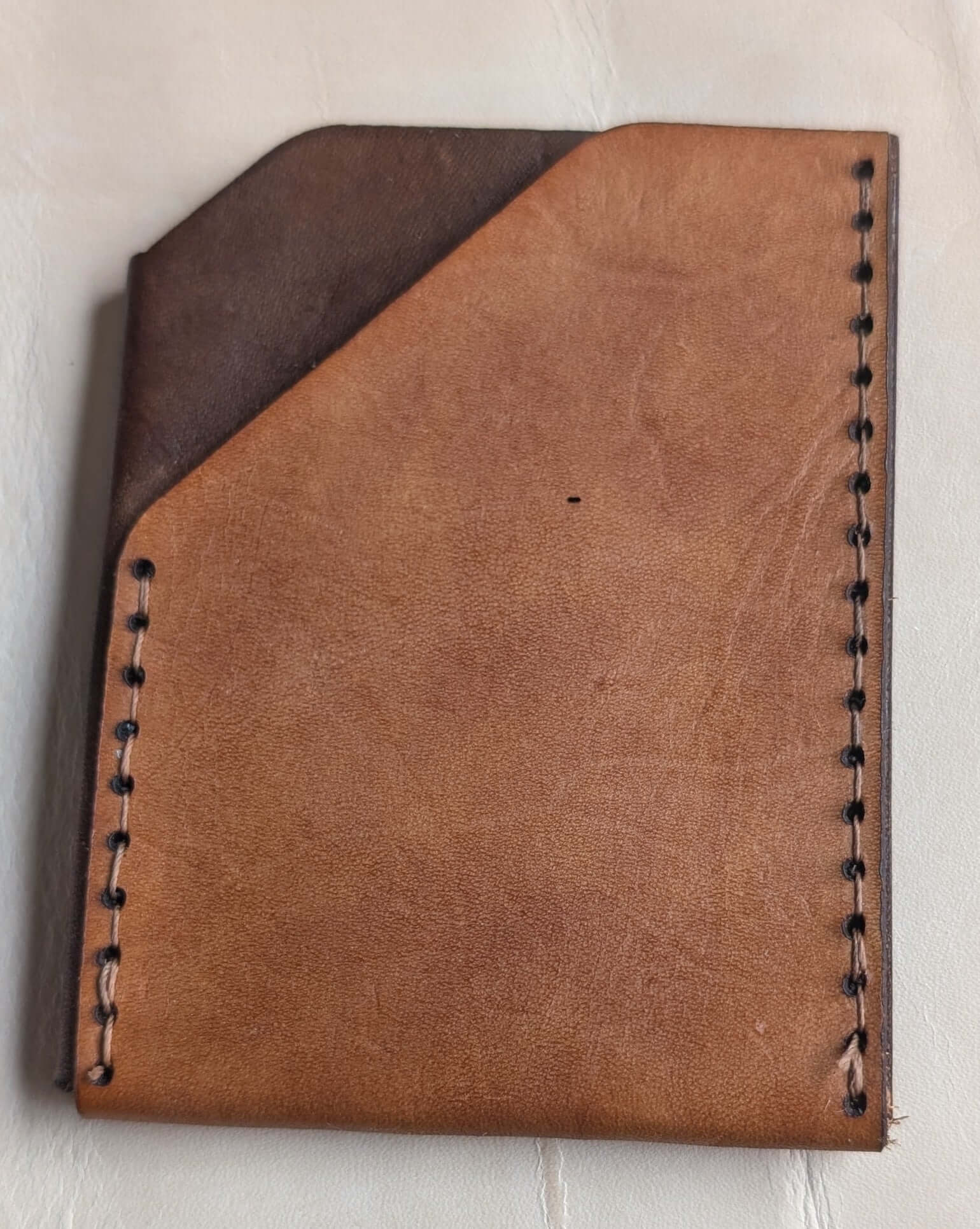 Minimalist hand made leather card sleeve