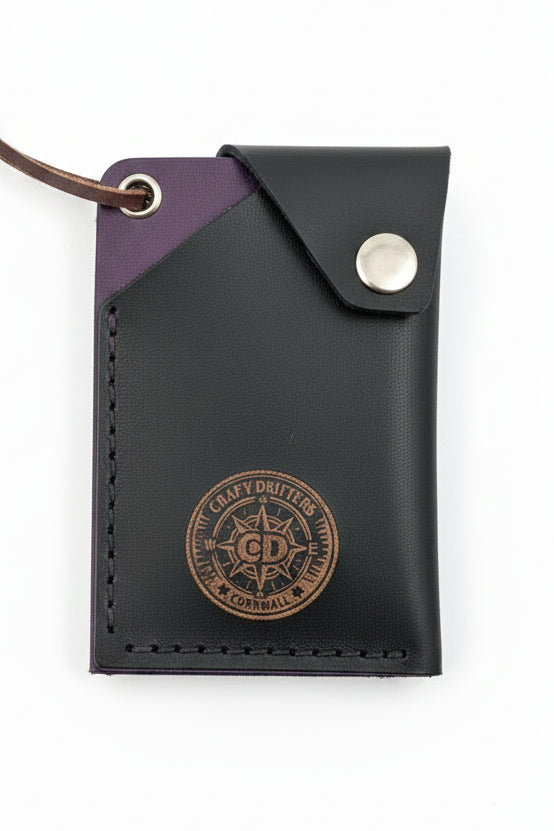 Compact flap top card holder holding multiple cards and notes for organized daily carry