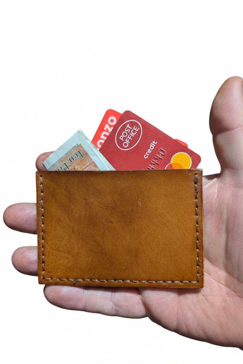 Light brown Basic Card Sleeve made from full-grain leather with hand-stitched detailing