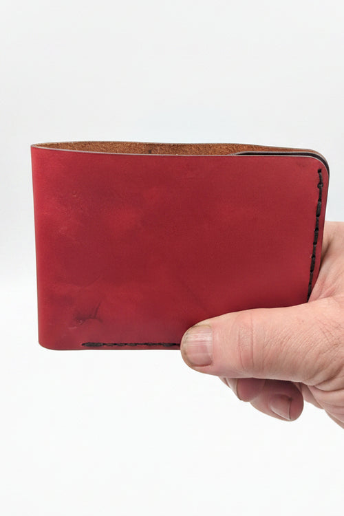 Bi-Fold four pockets and a full length cash fold