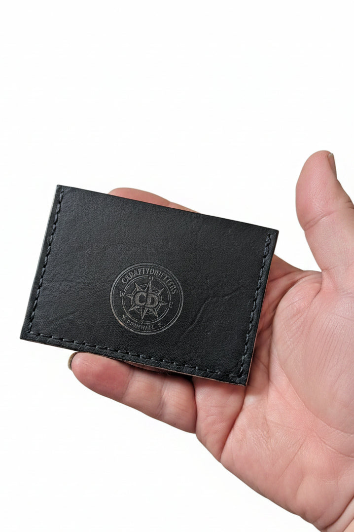 Drifters Single Pocket black full-grain leather card sleeve with hand-stitched detailing