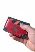 The Flip Flop minimalist hand-dyed leather wallet holding cards and notes