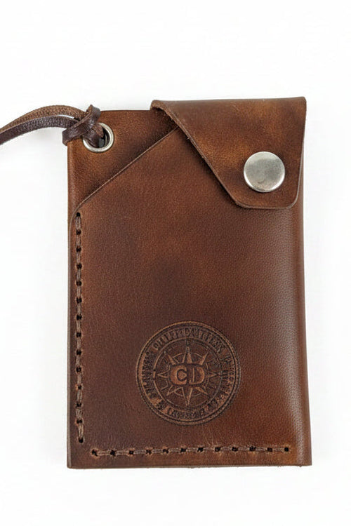 Compact flap top card holder fitting up to 8 cards and notes for organized daily carry