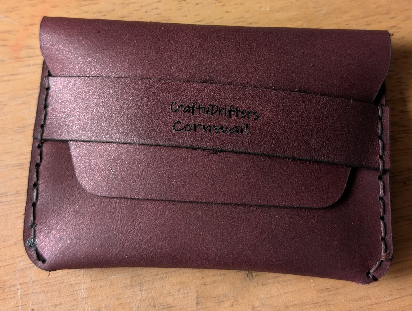 Minimalist leather Card Holder with tuck flap in Mettallic Red Leather